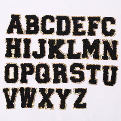 シュニール パッチのA-Zによって刺繍されるアルファベットの手紙の金のきらめきのボーダー鉄