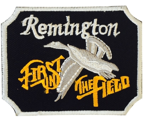 Remingtonの火は9x6cm衣服のためのパッチのバッジの刺繍の鉄を武装させる
