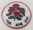 ロゴの赤いバラの衣類のための円形の刺繍パッチをカスタム設計しなさい